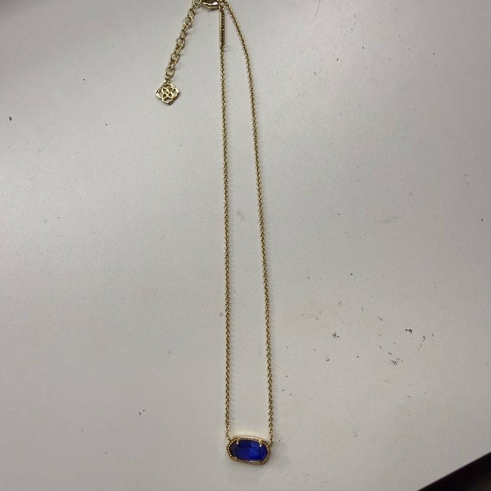 Elegant Gold Necklace with Blue Pendant